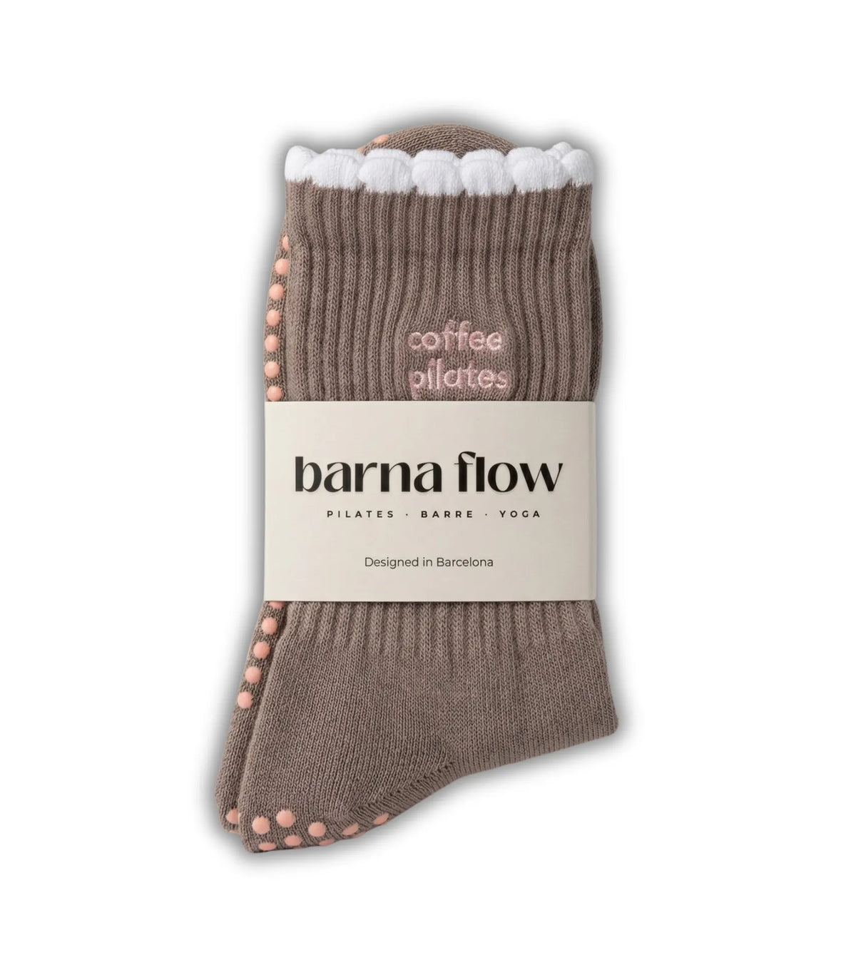 Une paire de chaussettes antidérapantes barna flow dans son étui Designed in Barcelona