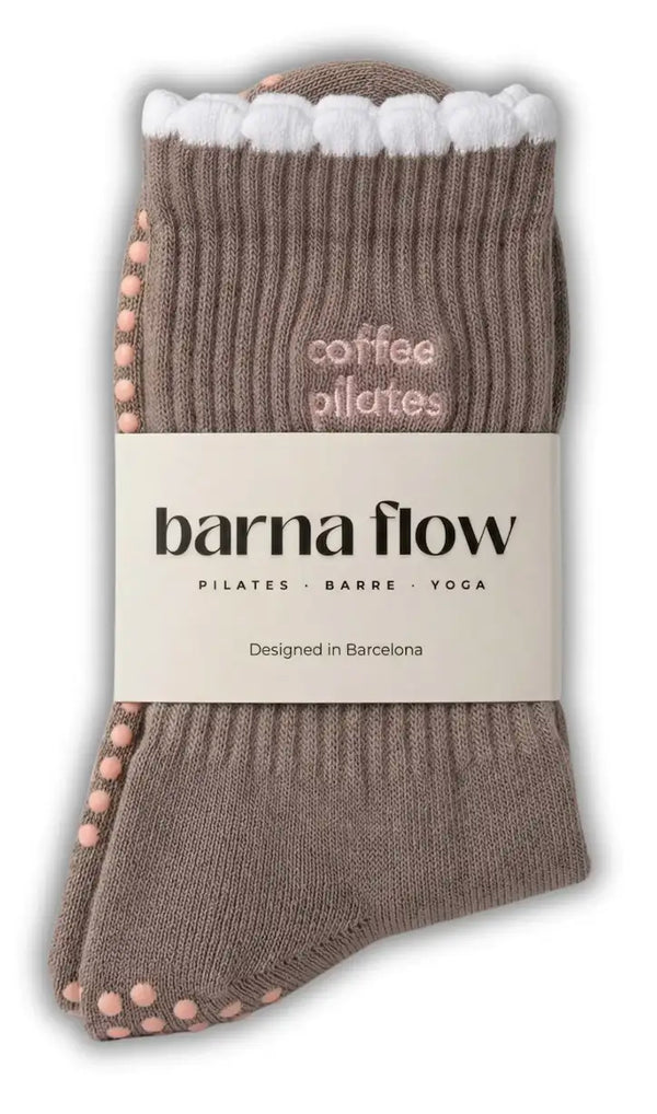 Eine barna flow Anti-Rutsch-Socke in ihrer Hülle